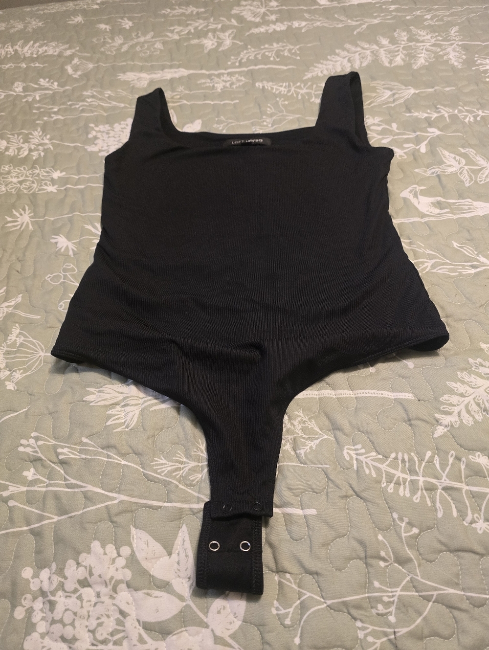 LOFT Versa  black ribbed top with crew neckline